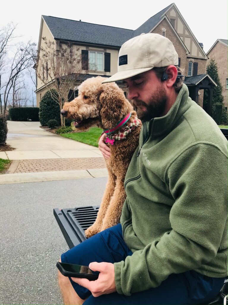 Scott, a master dog trainer and his Goldendoodle, Maple.